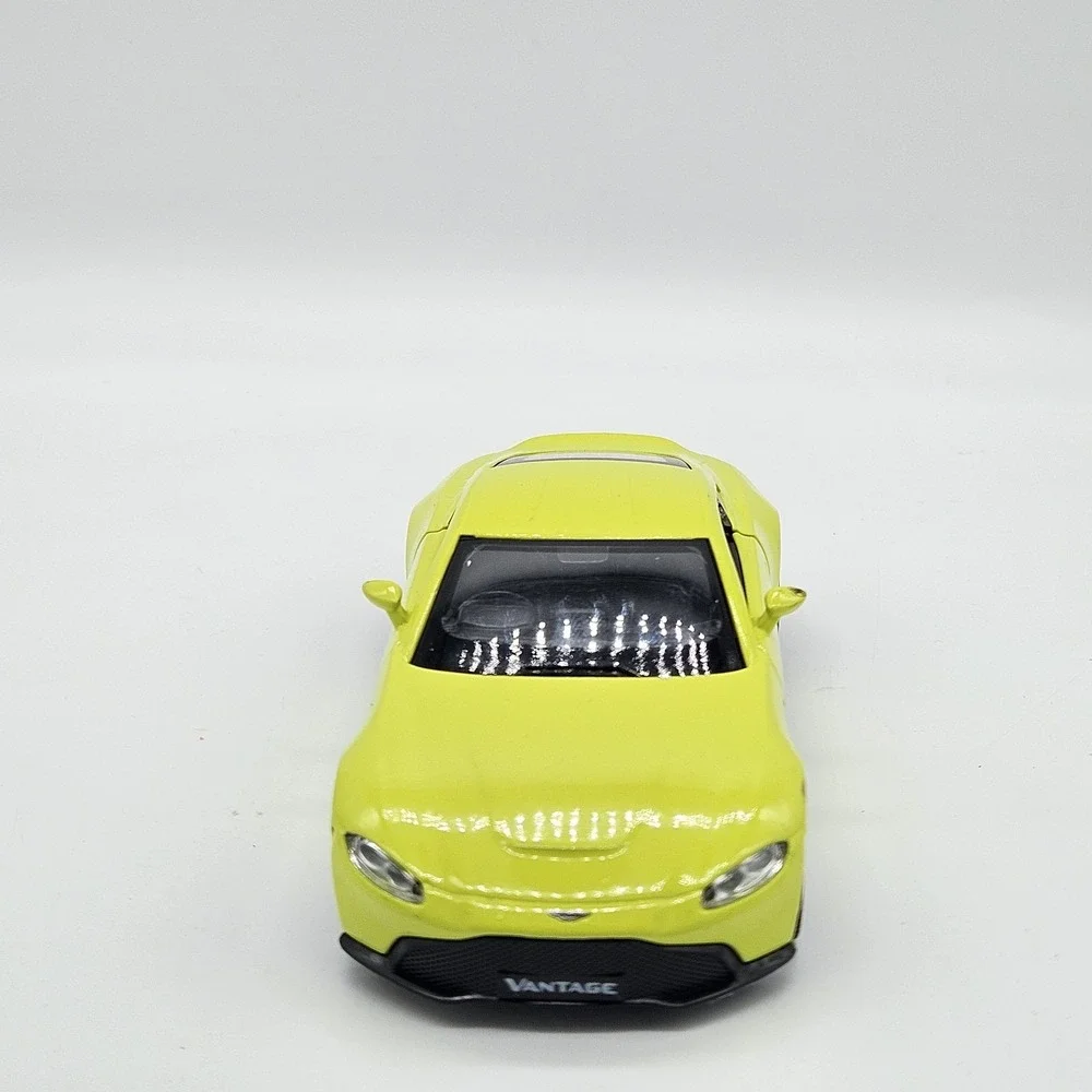 RMZ City Aston Martin Vantage Yellow Diecast Model Car 5 inch Pullback